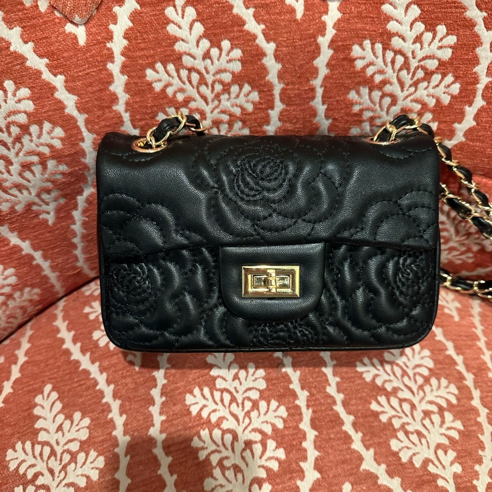 Flower embroidered flap bag